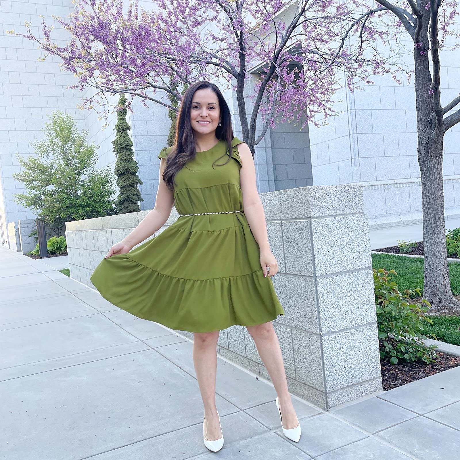 A reviewer photo of the dress in green