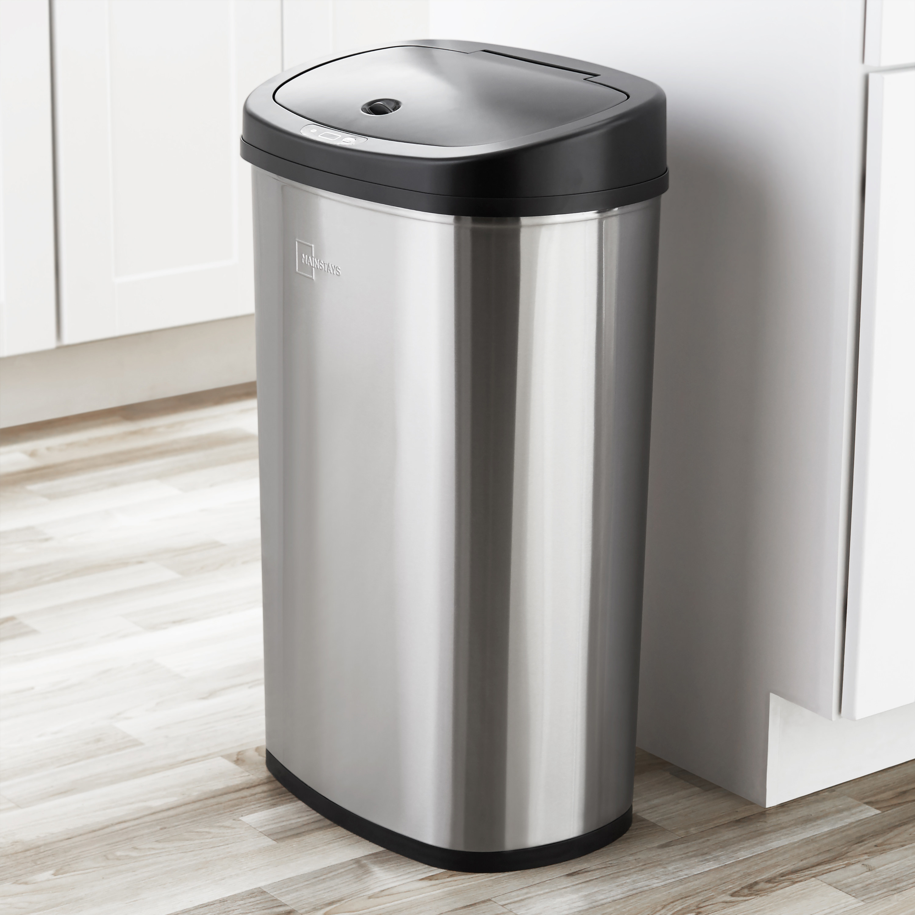 the mainstays 13 gallon trash can in a kitchen
