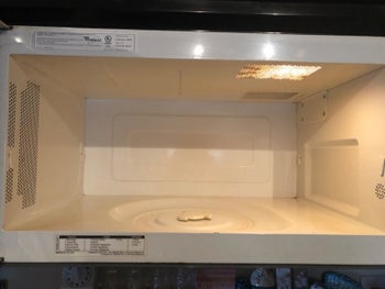 reviewer's clean microwave after using an angry mama cleaner
