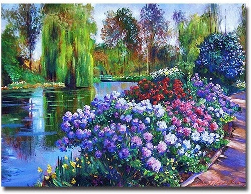 The wall art featuring a colorful painting of flowers and trees by the water