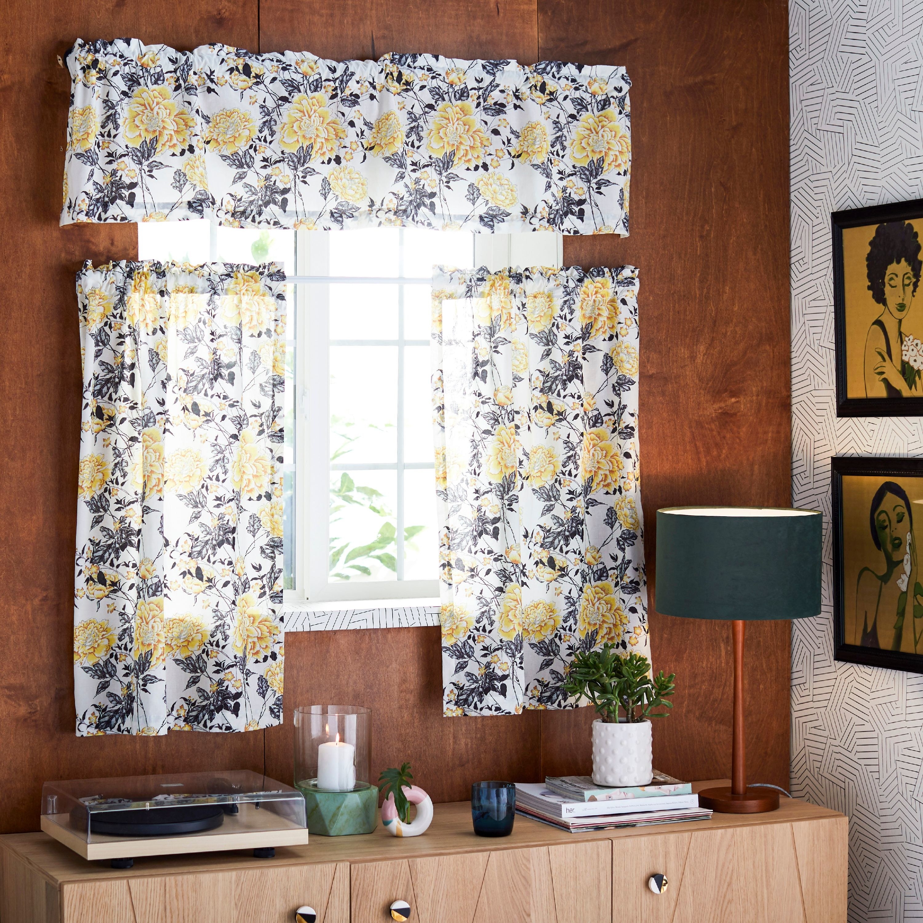 The curtains featuring a floral pattern