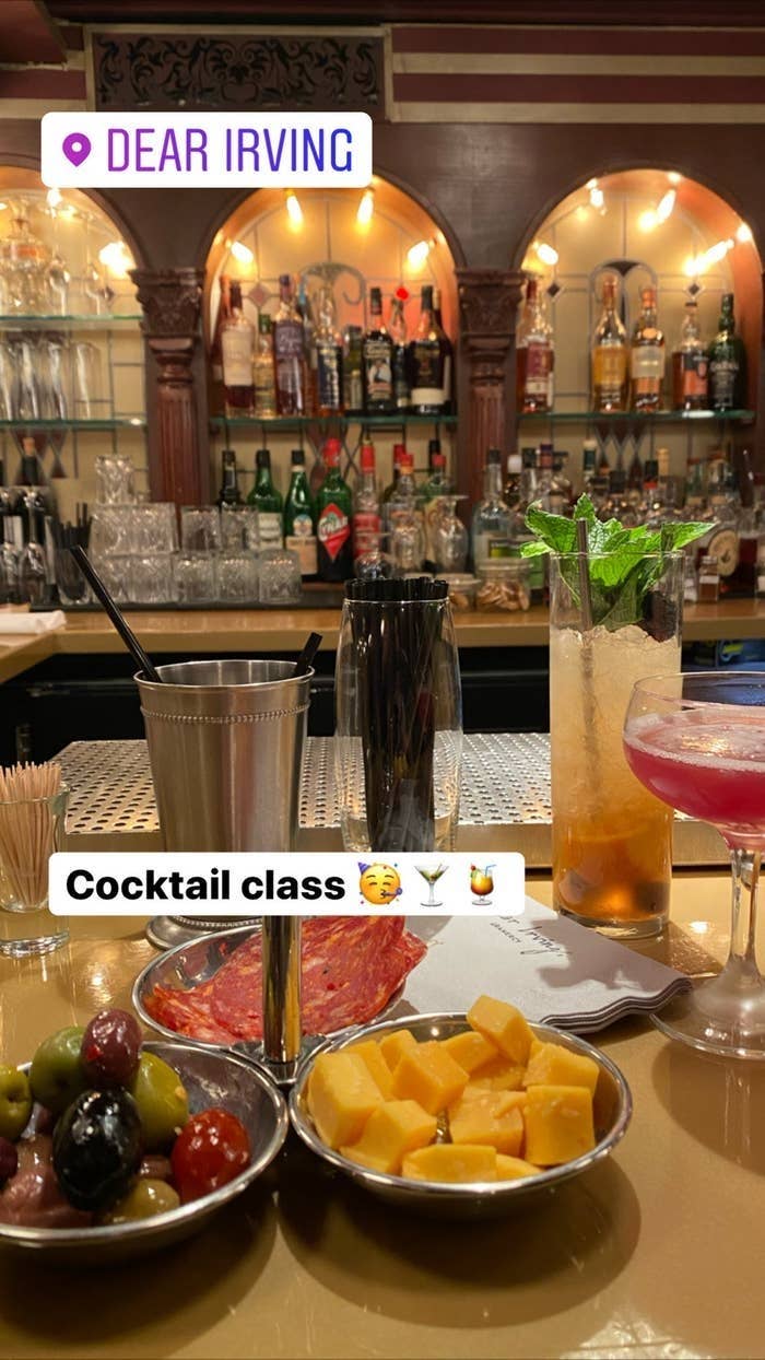 Snacks and cocktails set up at a cocktail making class.