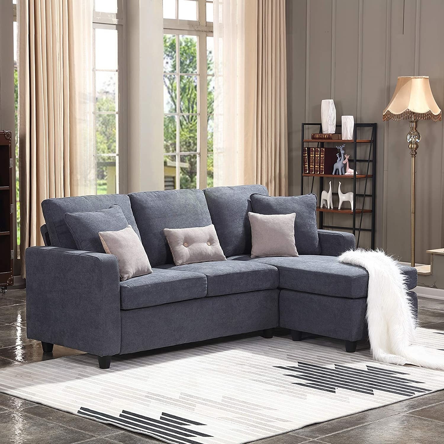 A convertible sectional sofa that seats two people comfortably 