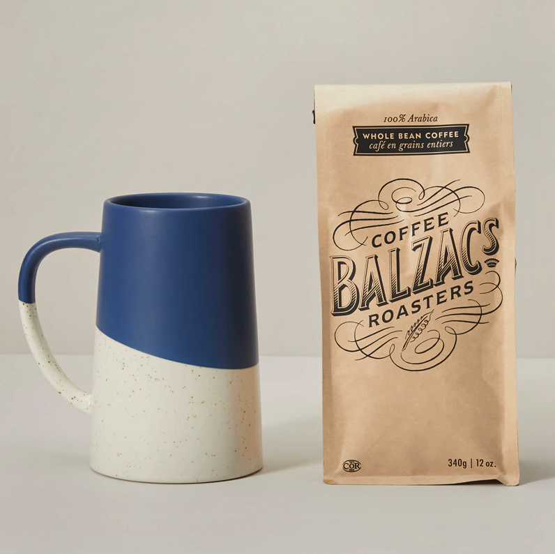 The mug next to the bag of coffee
