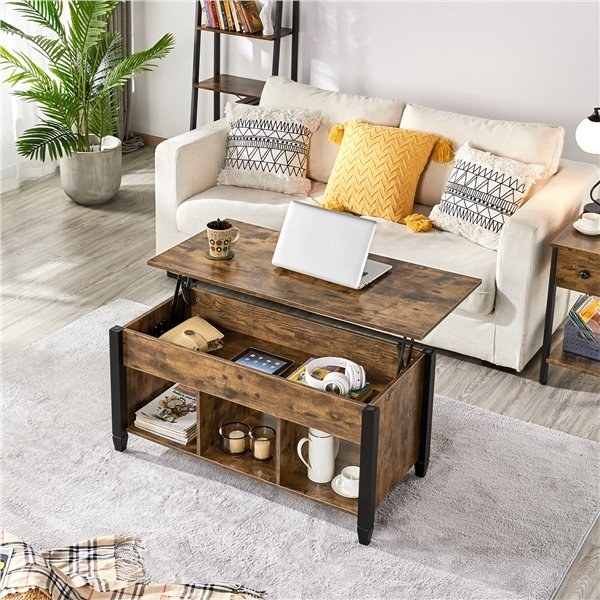 the rustic wood lift top table open and displaying the storage ability