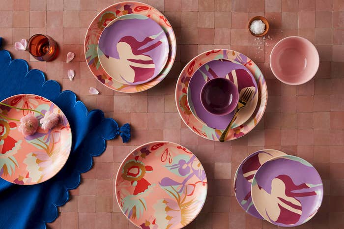 the purple, coral, pink, and mint floral dinner plates, purple, mint, magenta, and peach salad plates, and solid purple and pink bowls