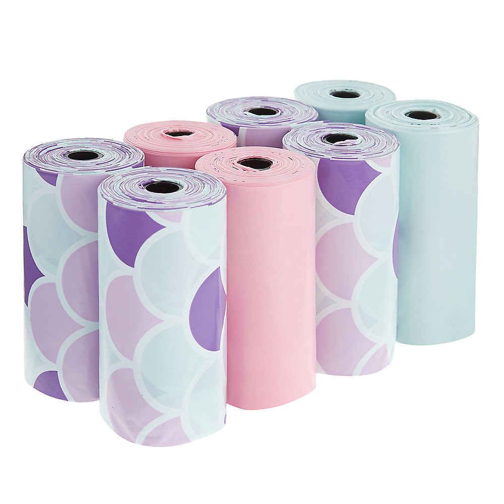 A set of pink, blue, and purple poop bags