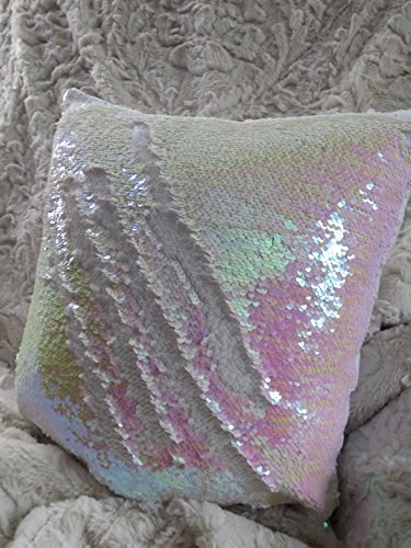 An iridescent sequin pillow cover.