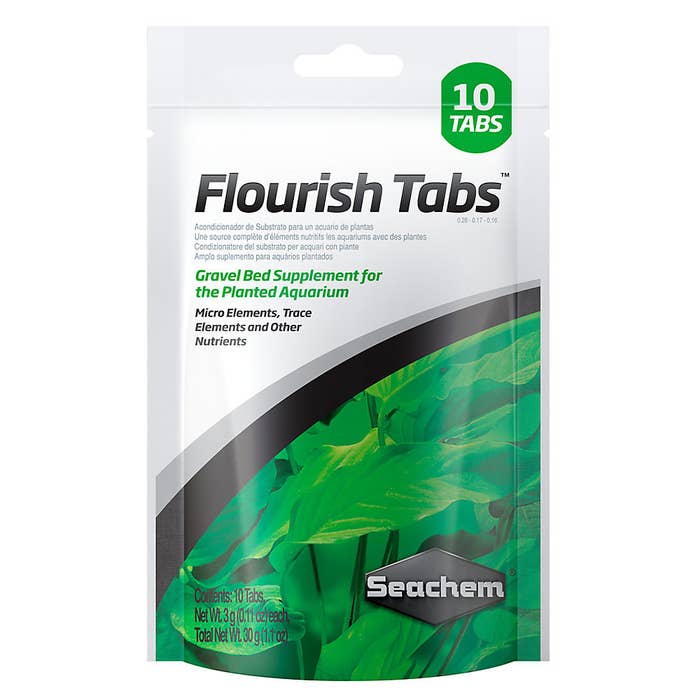 A green, black and white package of flourish tabs