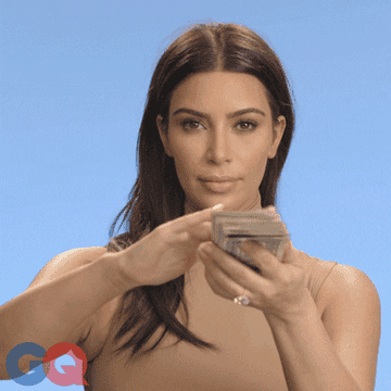 Kim Kardashian with a stack of money