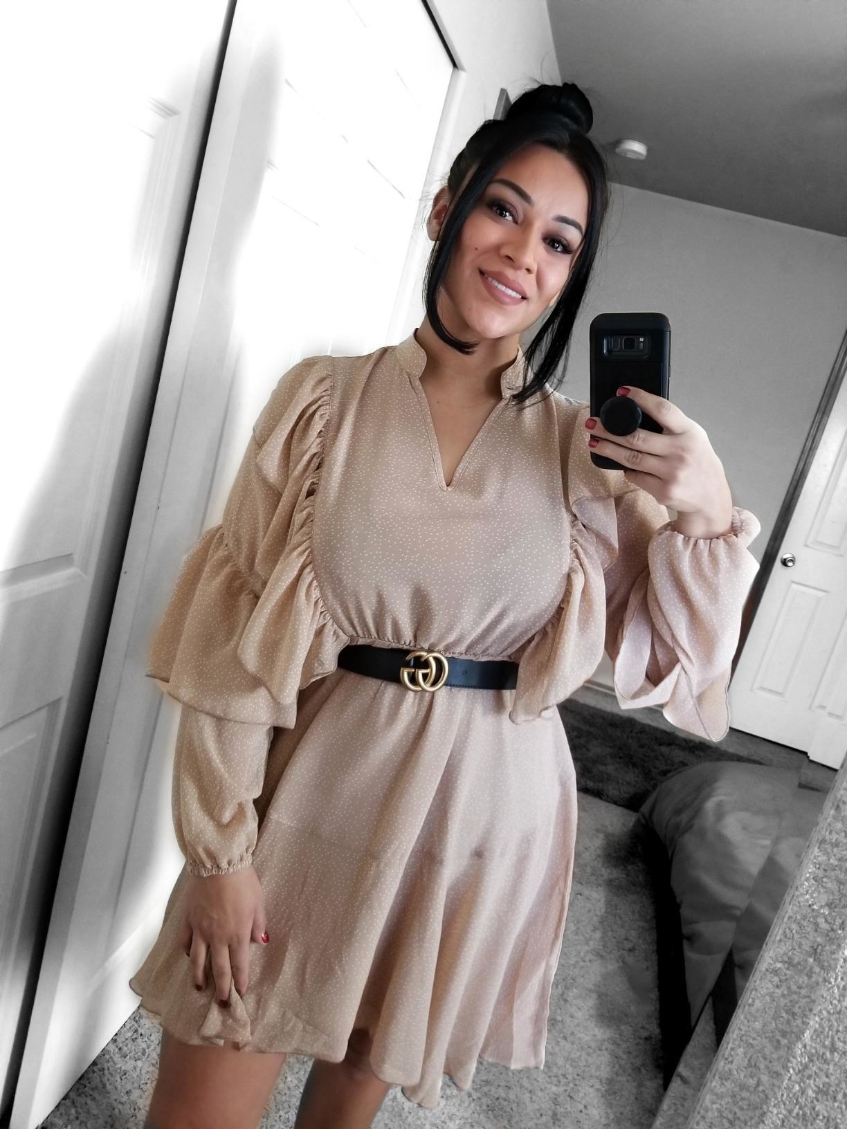 A reviewer photo of the dress in tan