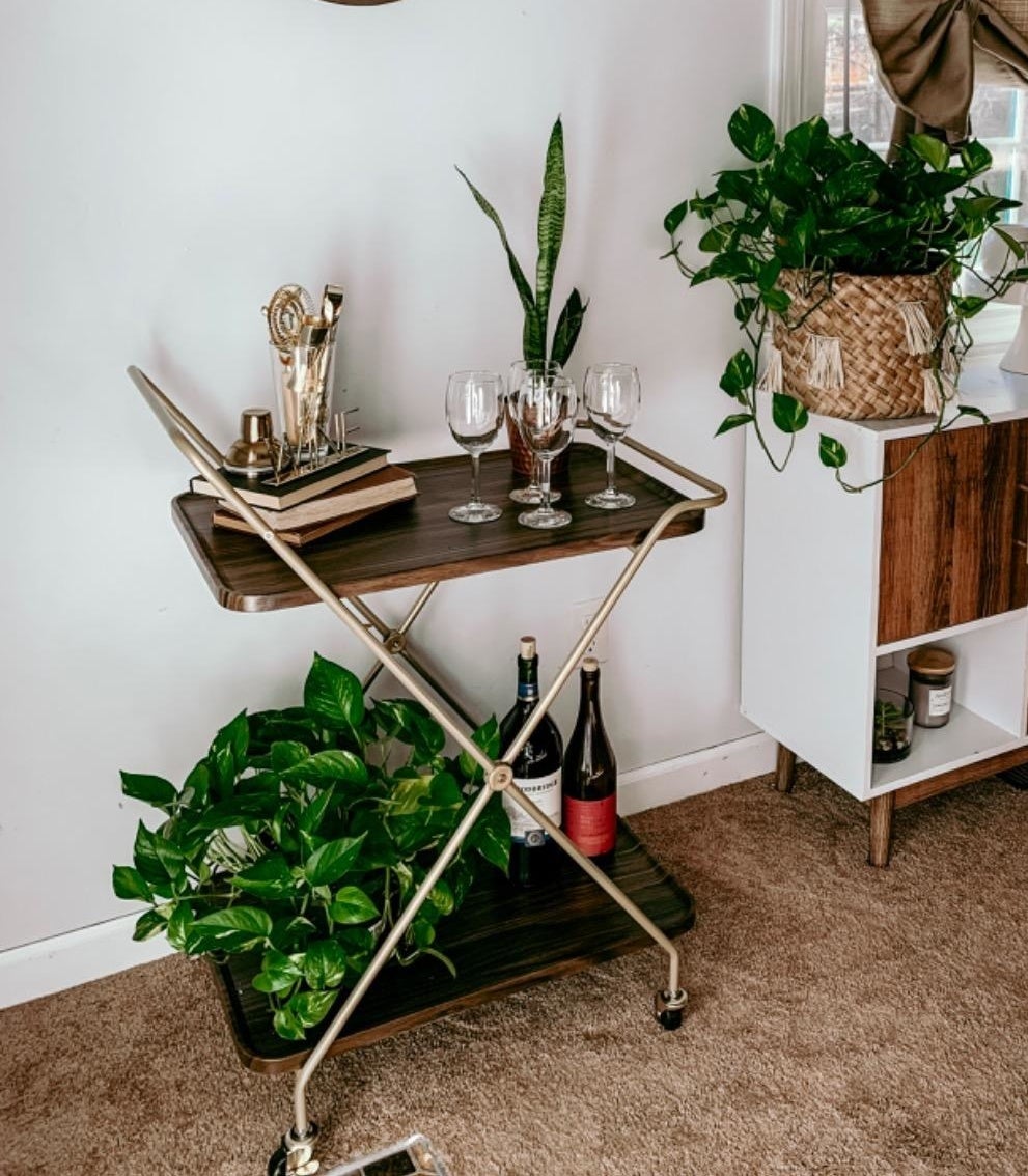 the wooden and gold bar cart