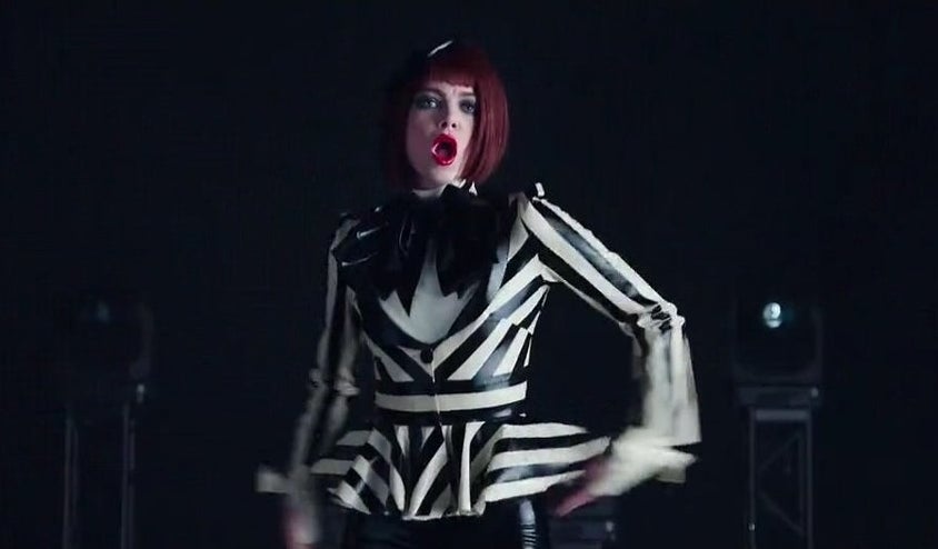 Emma Stone dancing in a music video
