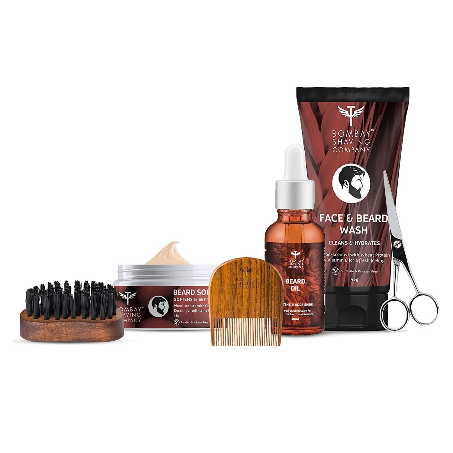 The kit contains a face and beard wash, beard oil, beard softening balm, brush, comb, and scissors.