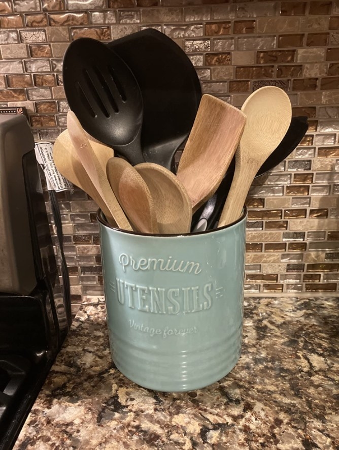 The utensil holder on a reviewer&#x27;s kitchen counter 