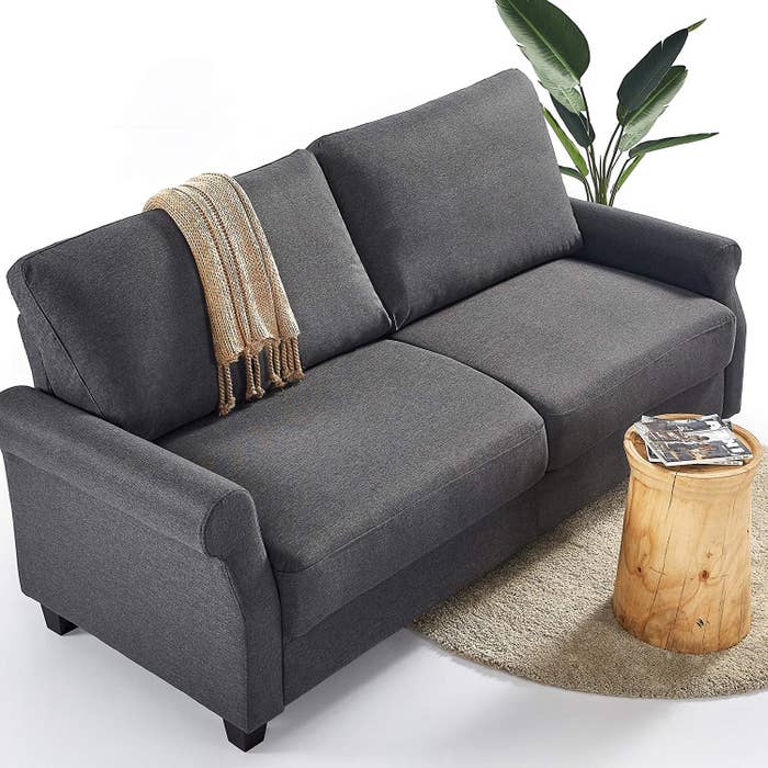 Gray two seater sofa couch 