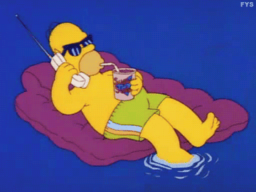 Gif of homer simpson relaxing on a pool float while sipping a cold drink