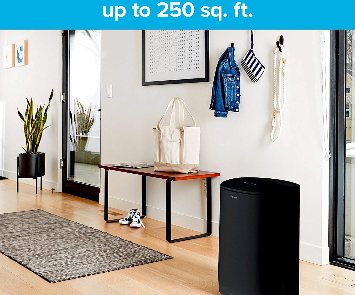 black filtrete air purifier in the entryway of a room