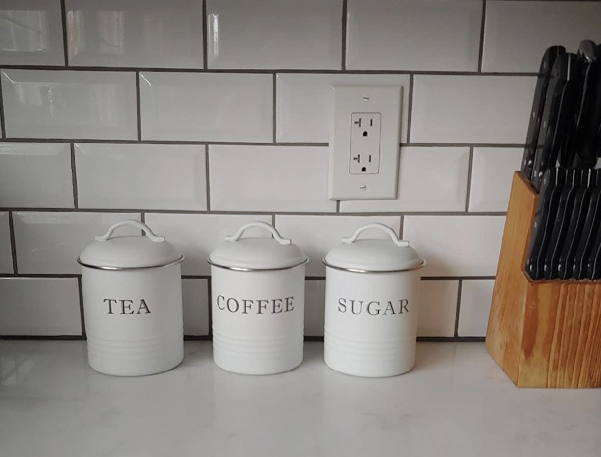 three canisters that read tea, coffee, and sugar