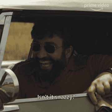 A GIF of someone stepping out of their car saying isn&#x27;t it snazzy