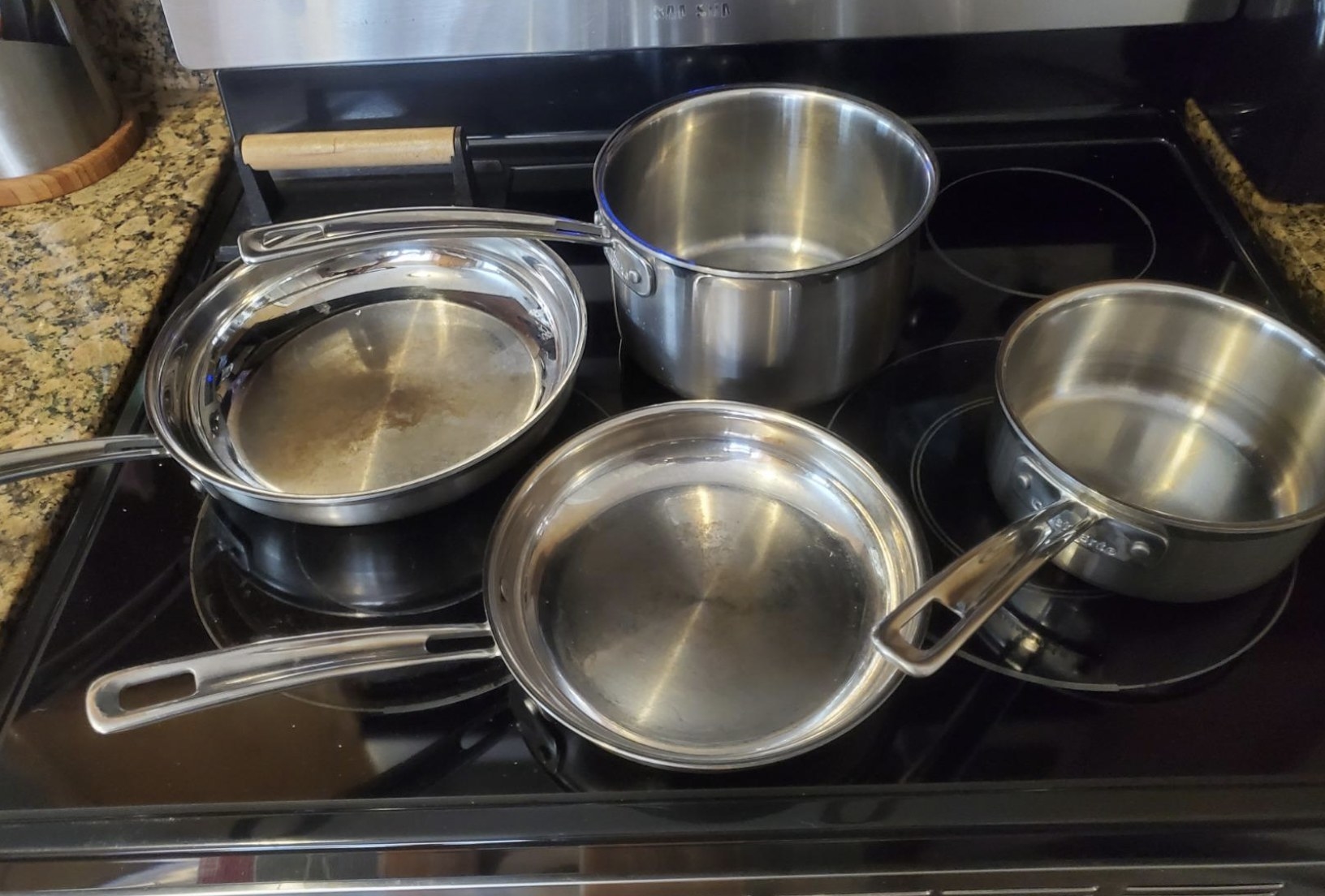 the full 7-piece set on a stove