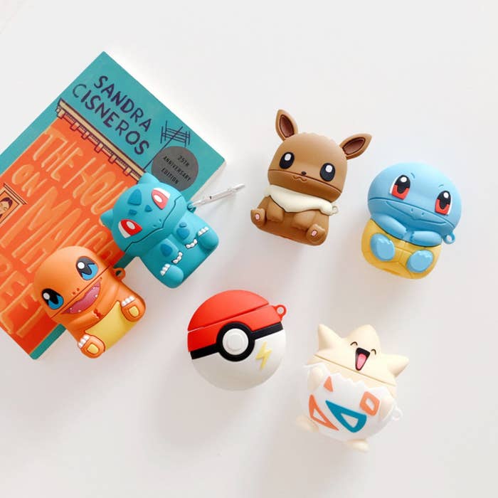 Six Pokémon-themed Airpods cases placed on table
