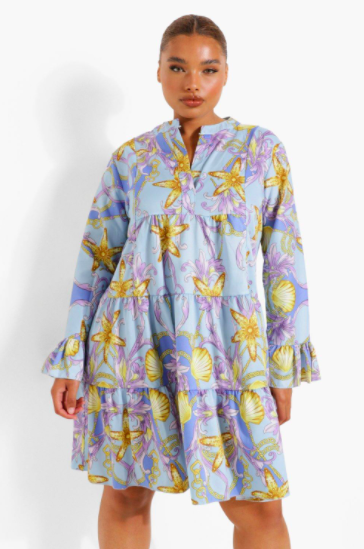 A model wearing the smock dress