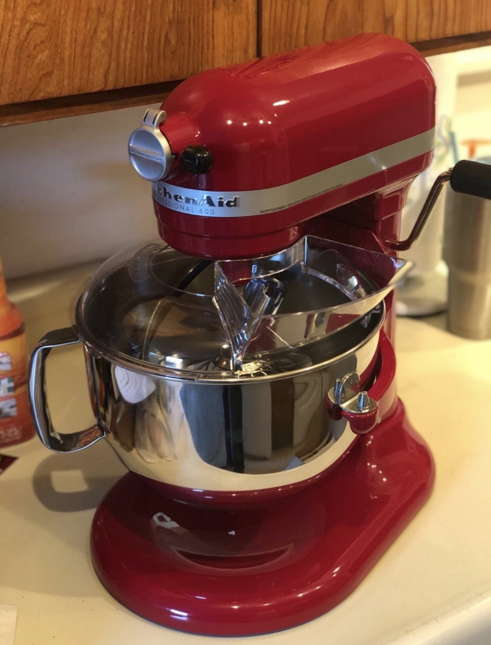 a red kitchenaid mixer