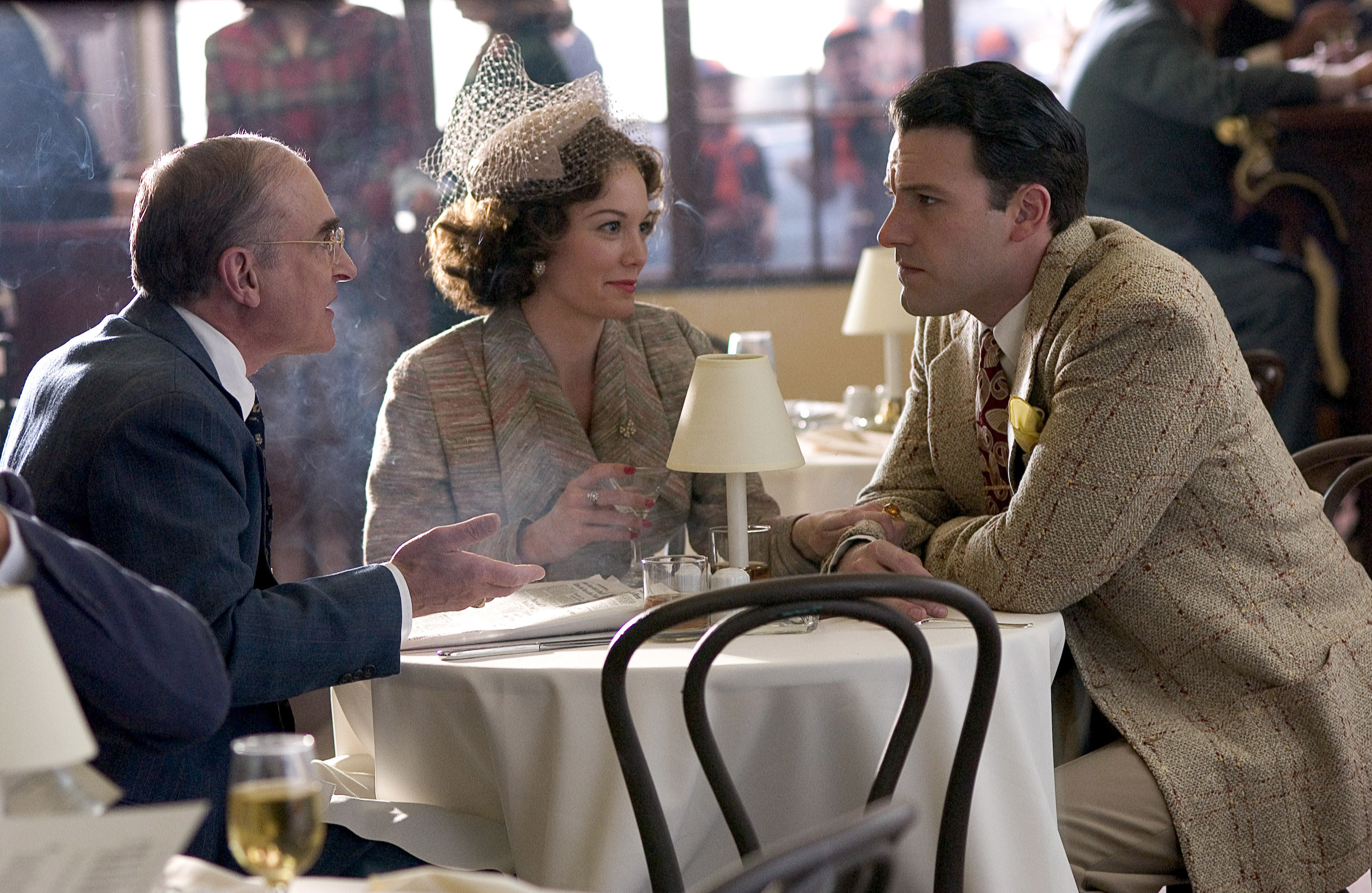 Jeffery DeMunn, Diane Lane, and Ben Affleck sitting around a kitchen table