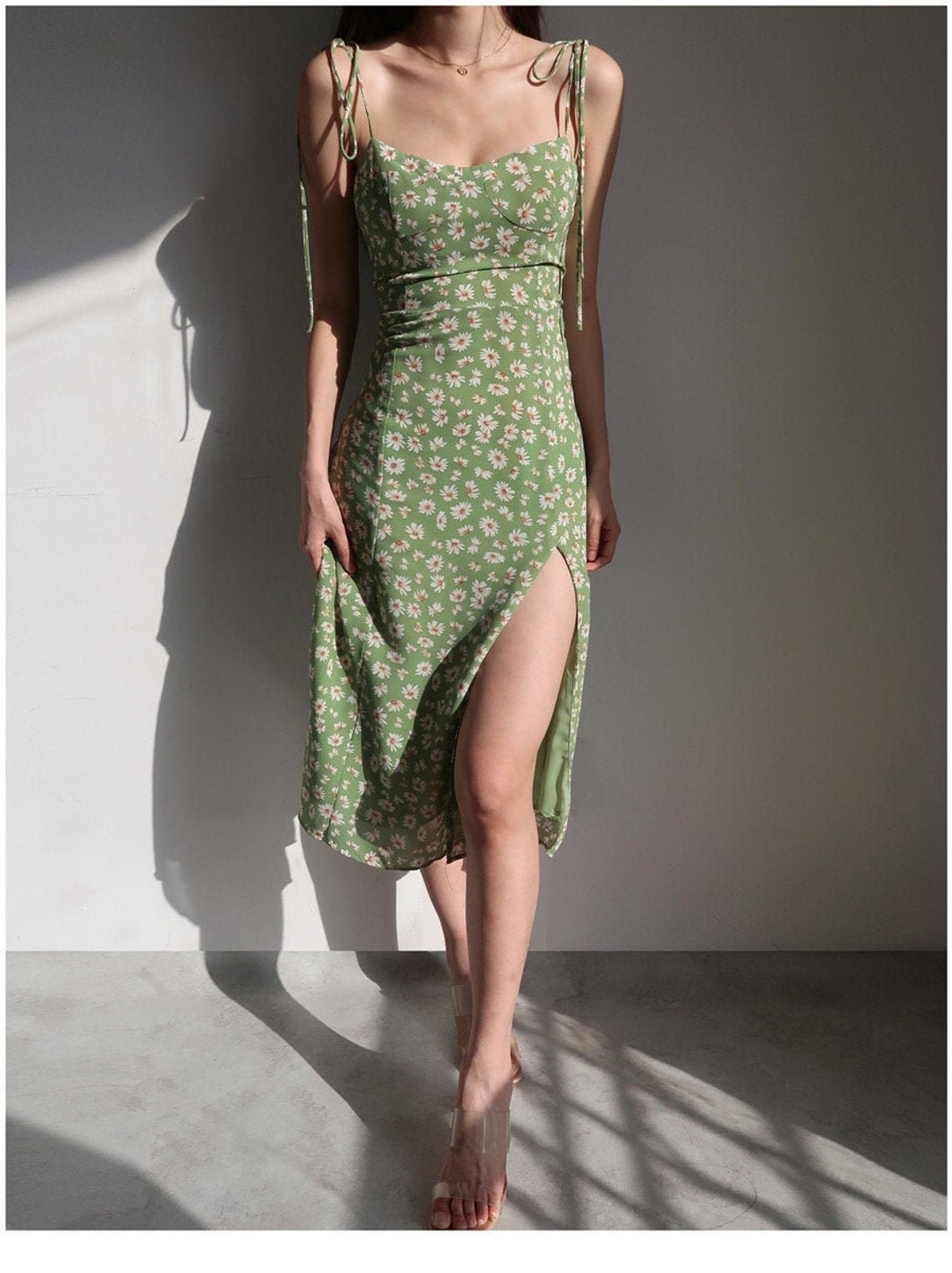 Model wearing the dress in green