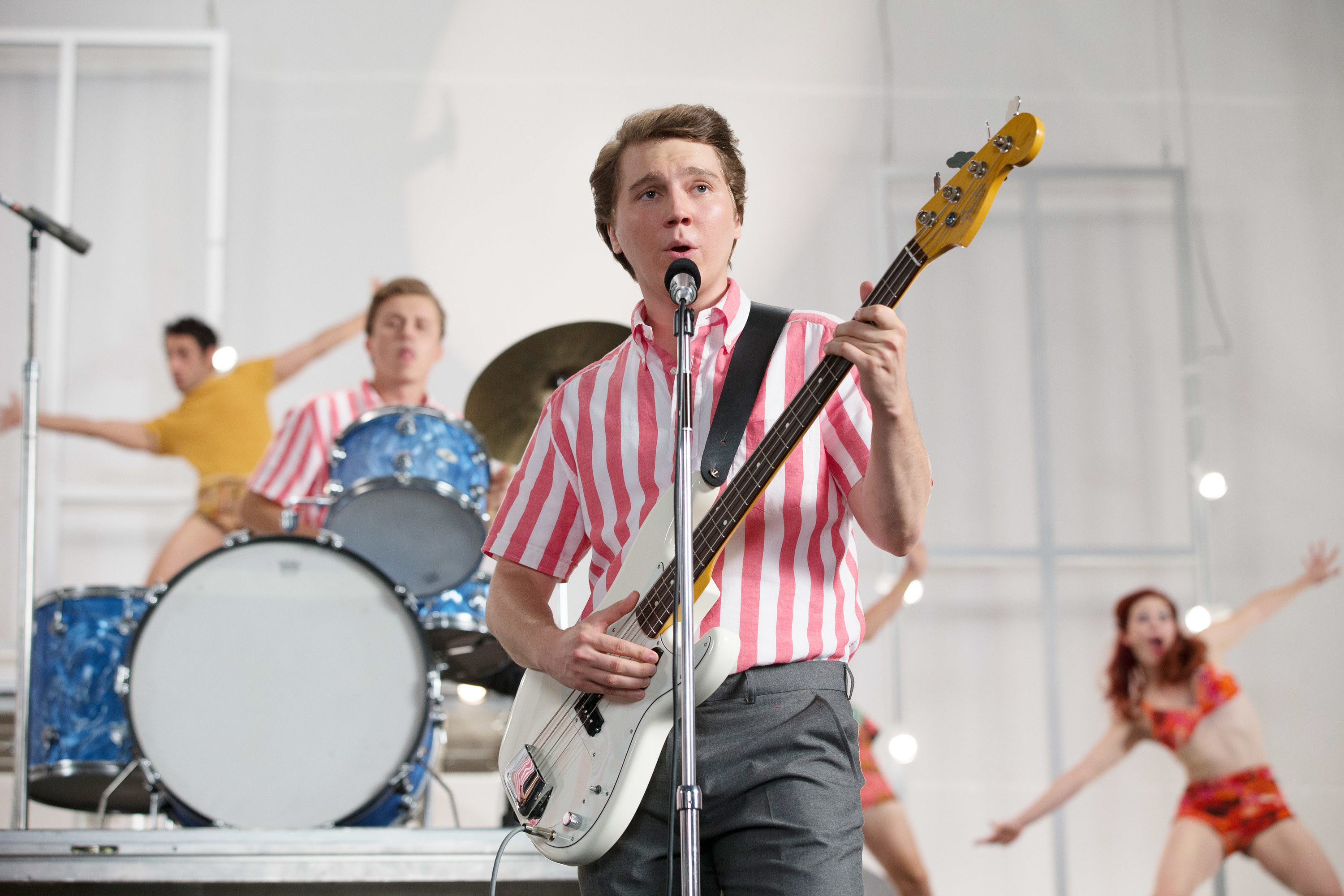 Paul Dano, as Brian Wilson playing bass and Kenny Wormald as Dennis Wilson playing drums