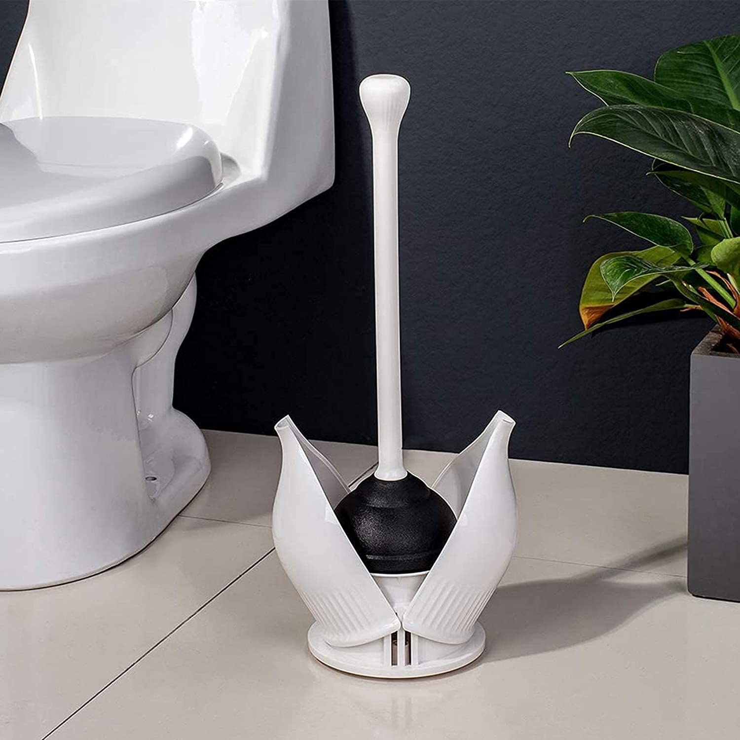 A hideaway toilet plunger and caddy