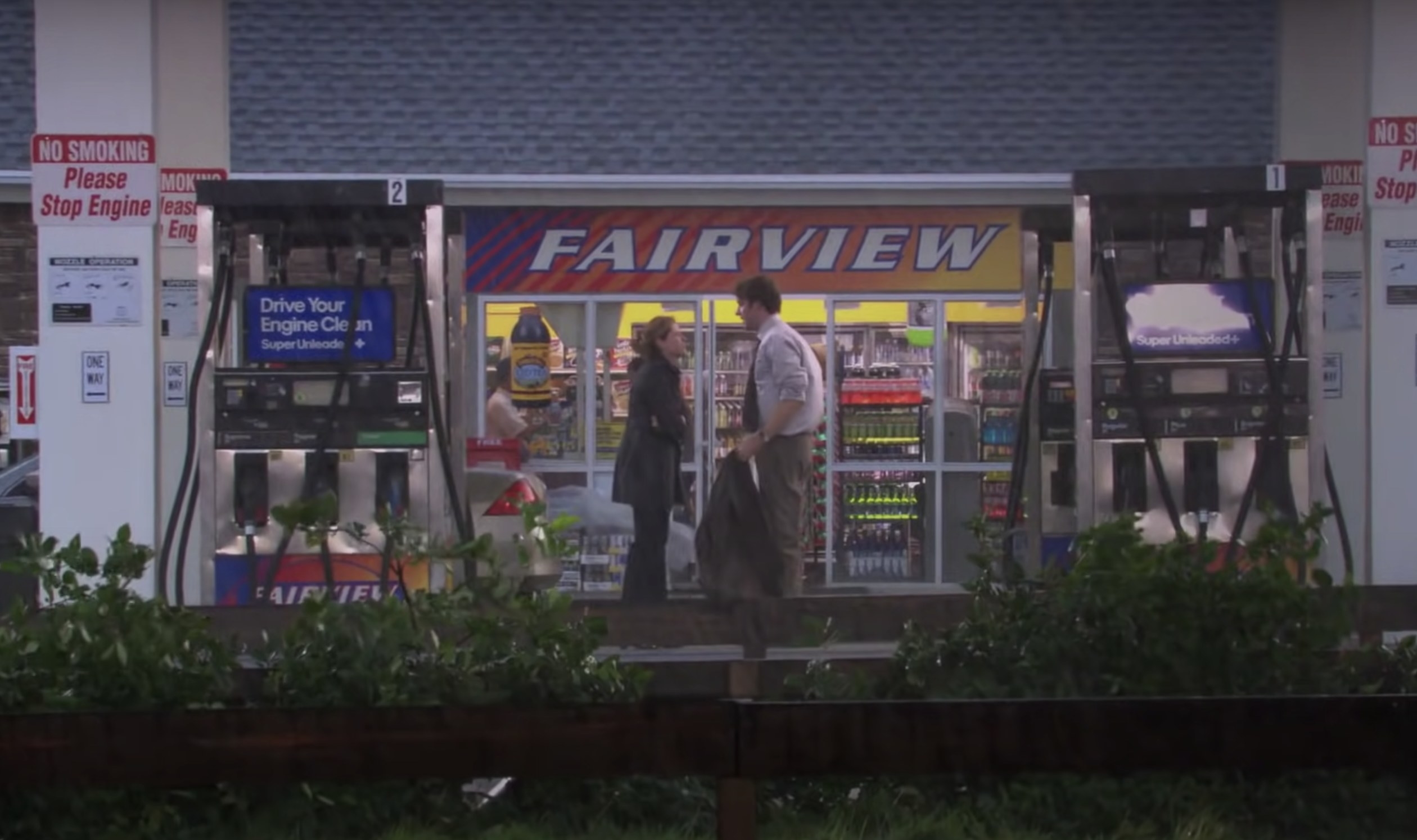 Jim and Pam look at each other outside the gas station