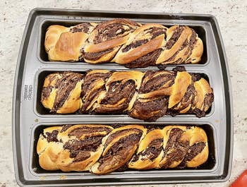 Reviewer image of pan with babka cooked inside 