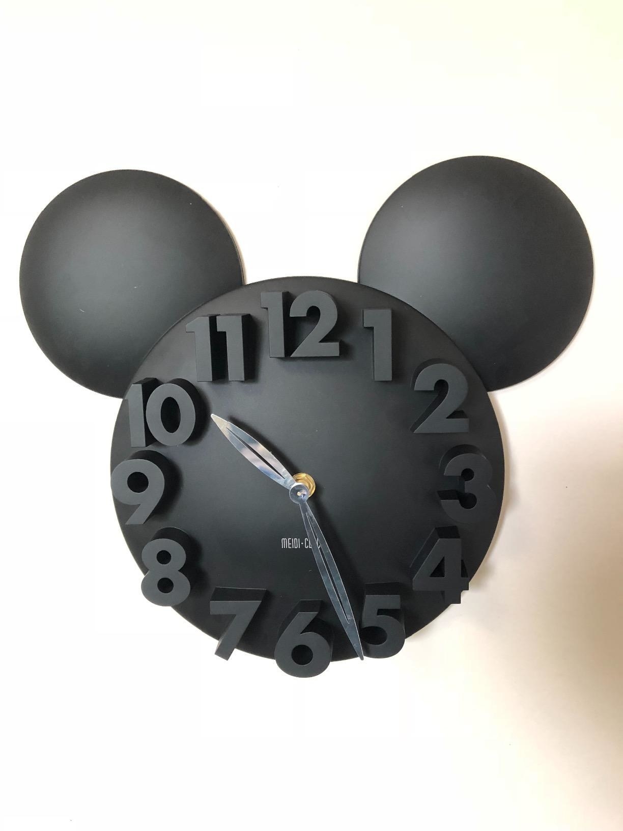 Mickey clock hanging on wall