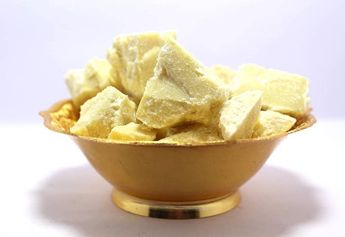 A bowl of chunks of cocoa butter.