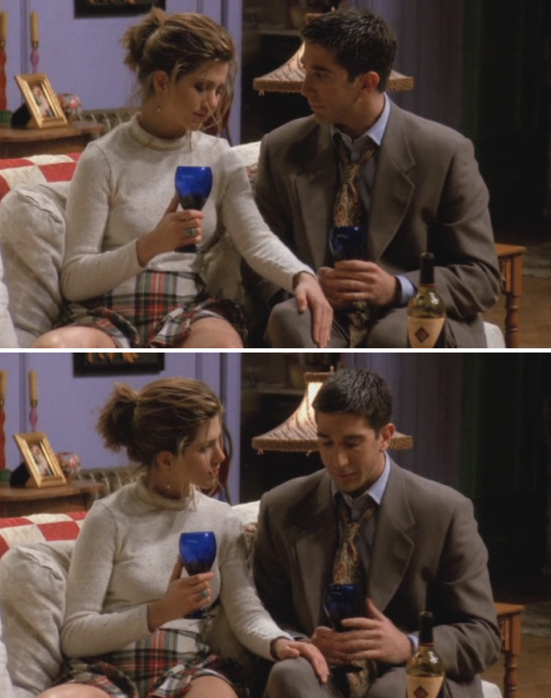 Ross and Rachel sitting on the couch drinking wine, Rachel touching his thigh