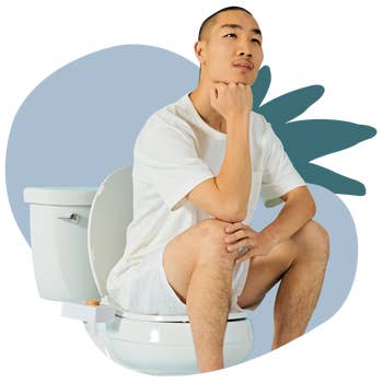model sitting on toilet with bidet