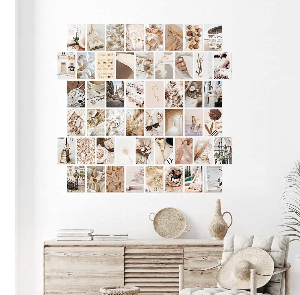 The neutral wall collage kit hanging above a table