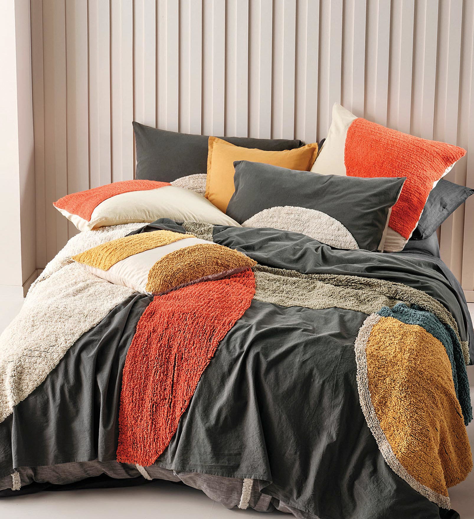 a textured duvet cover set on a comfy bed 