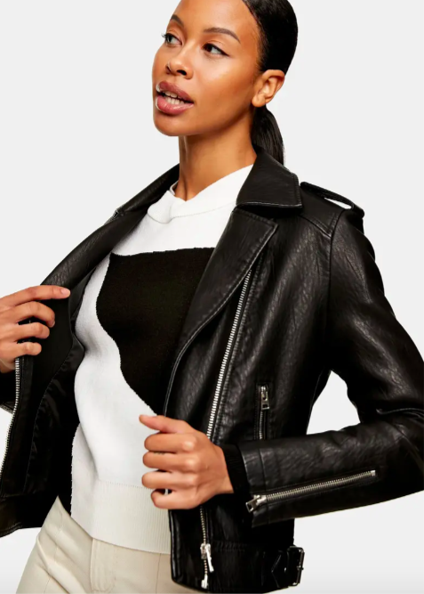 A model wearing the moto jacket in black