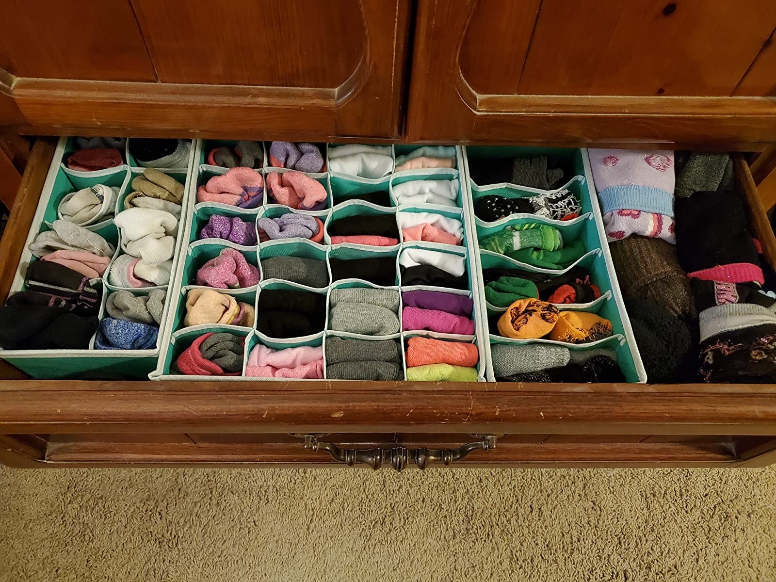 The drawer organizers organizing many pairs of socks