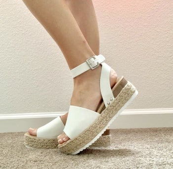 Reviewer photo of the white sandals
