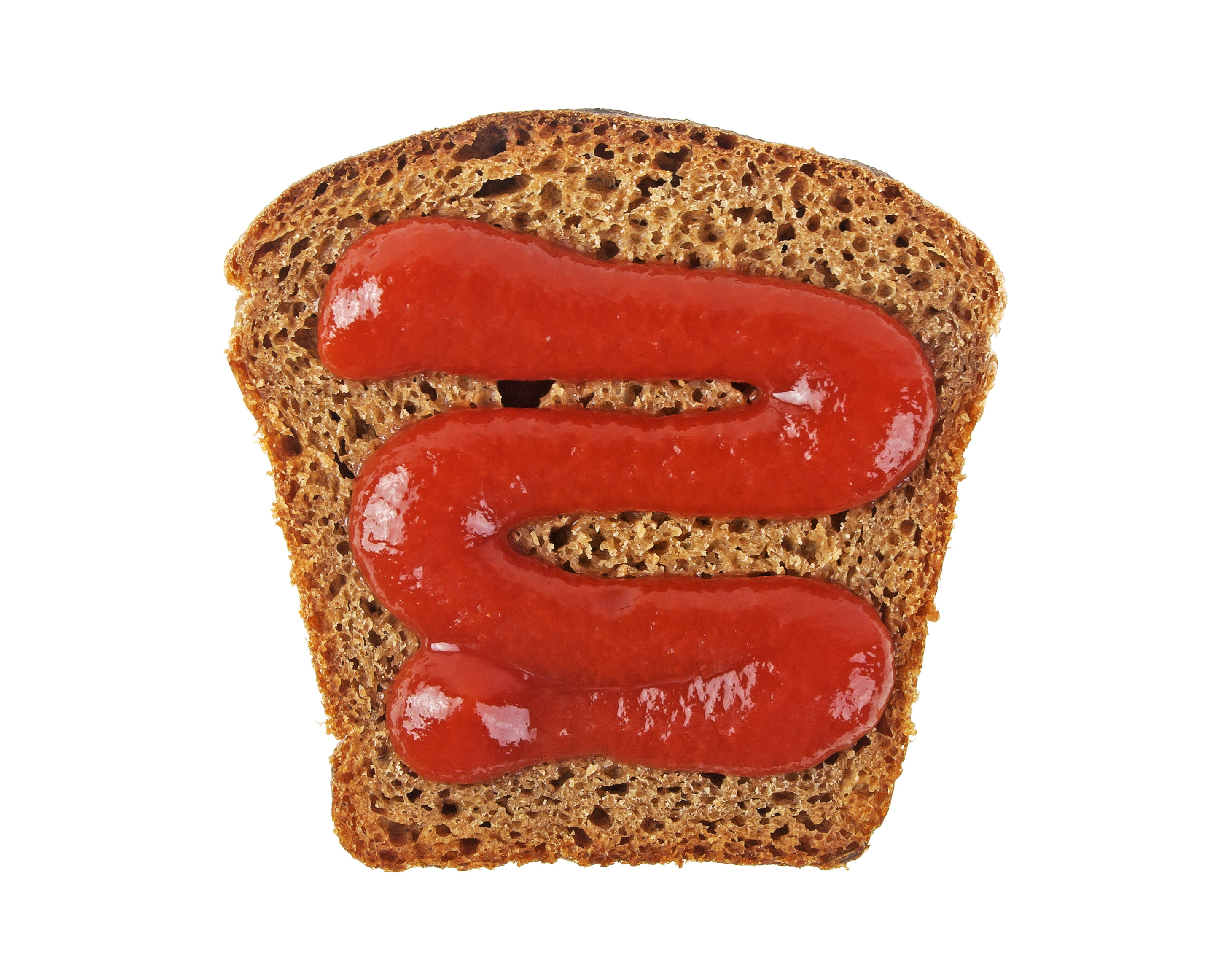 Slice of wheat bread with a swirl of ketchup