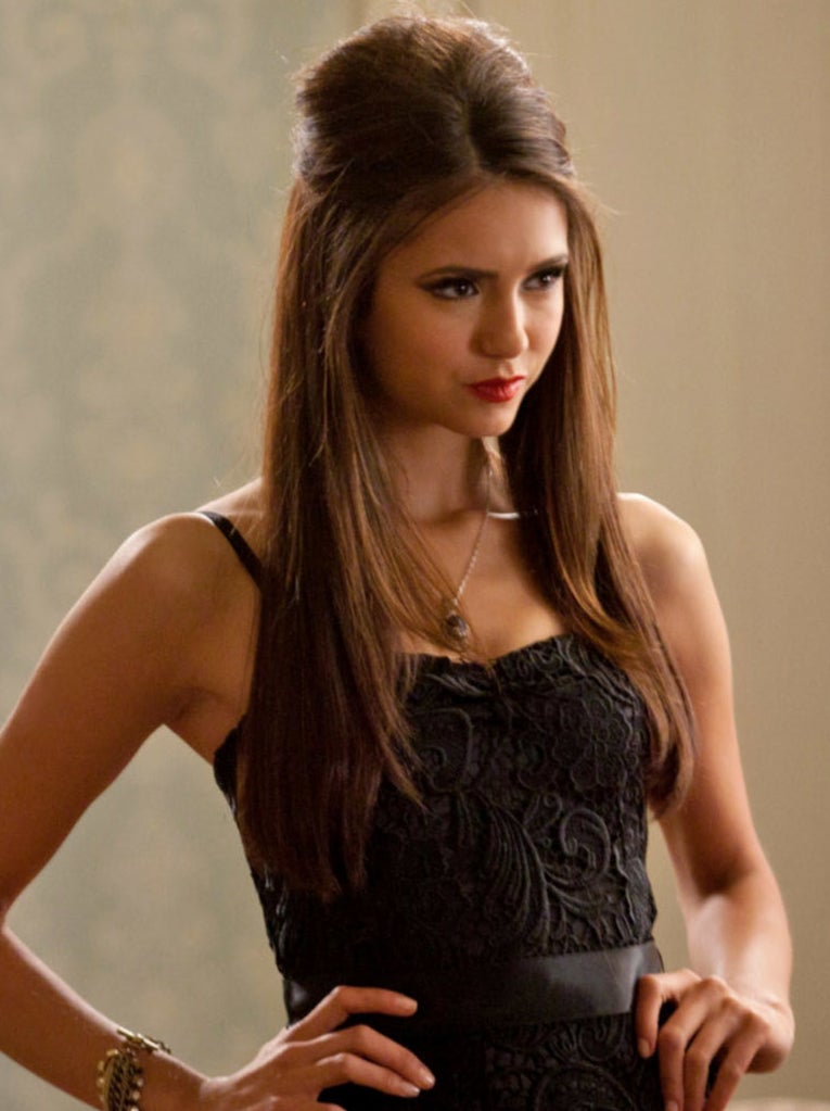 Nina with her hands on her hips as Katherine on "The Vampire Diaries"