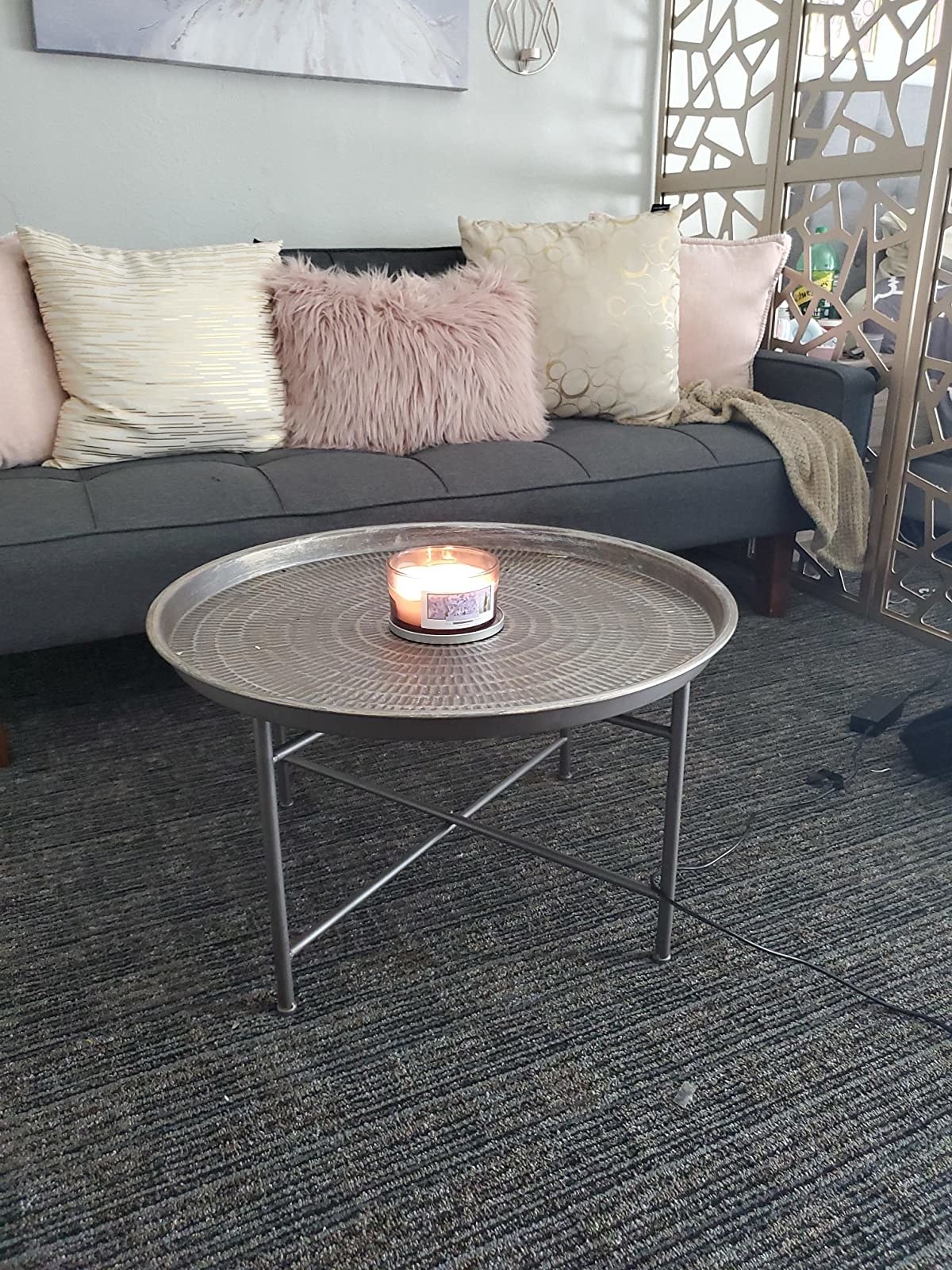 A reviewer photo of the table in silver