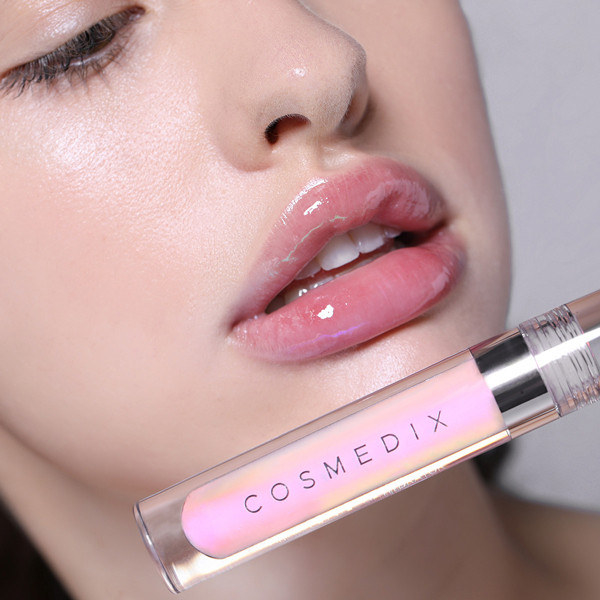 model wears glossy lip hydrator on lips