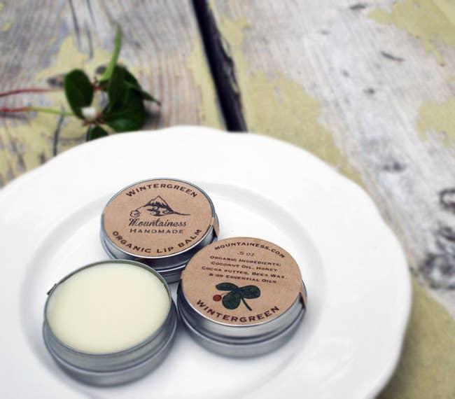canisters of wintergreen organic lip balm 