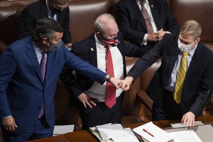 Ted Cruz fist-bumps Jim Jordan