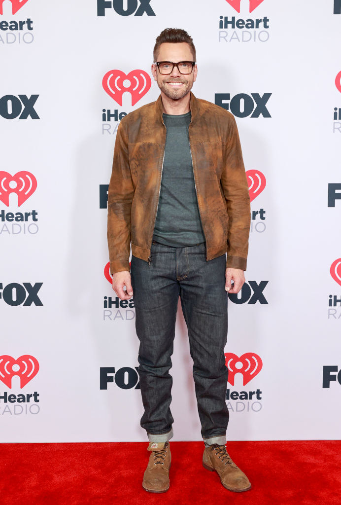 Joel McHale wore jeans and a leather jacket